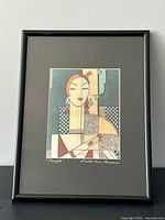 Full view of framed print showing image, mat and frame