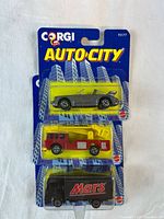 Front view of sealed Corgi Auto City blister pack showing three vehicles