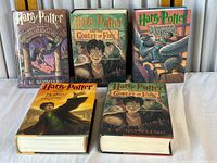 Front view of all five Harry Potter hardcovers with dust jackets