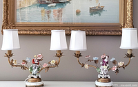 Both porcelain figurine lamps side by side