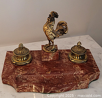 Full view of red marble base, brass rooster, and two brass inkwells