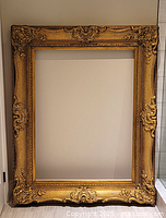 Full view of large gilt wood frame front