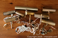 Group shot of eight picture lights with cords