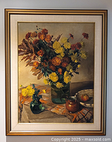 Frontal view of framed oil painting on wall