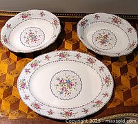 Three Royal Albert Petit Point serving pieces on table