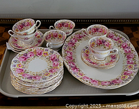 Full set on tray showing platter, plates, cups and saucers