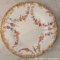 Top view showing full plate design and gilt rim