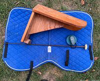 All items laid out on grass showing overall condition and scale