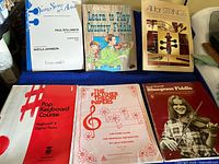 Six instructional music books for piano, fiddle, keyboard and strings