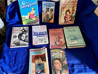 Eight books including The Story Girl, Little House in the Big Woods, Rascal, Fantastic Mr. Fox, and others