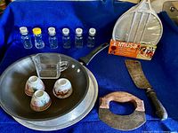 Overall group shot showing all items laid on blue cloth