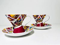Two matching Royal Elfeda cups on saucers, side view shows shape and pattern