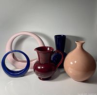 Group shot of all five solid coloured vases