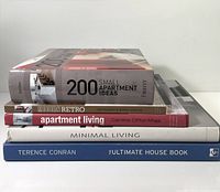 Stack of five hardcover home-design books showing spines