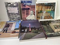 Group shot of all six books showing fronts and titles
