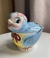Front-left view of bluebird cookie jar with lid