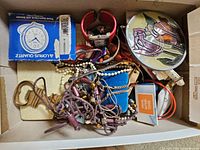 Box containing jewellery pieces, Lorus clock box, mirror, wristwatch