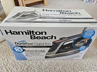Box of Hamilton Beach Durathon Digital Iron