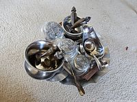 Group view of all metal and glass items piled together