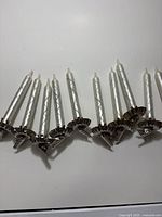 Group view of 10 silver clip-on candle ornaments