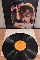 Front sleeve showing Bowie portrait and vinyl on paper sleeve