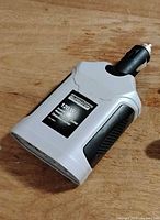 Front view of Summatech 120 W power inverter showing brand label