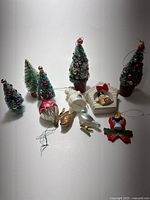 Group view of all nine Christmas ornaments