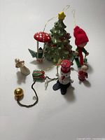 Group shot of all eight wooden ornaments