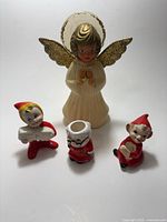 Group shot of all four ceramic Christmas pieces