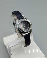 Front angled view showing dial, case and strap