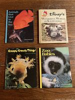 Front covers of all four books showing titles and animal imagery