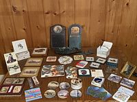 Full lot overview showing coasters, trivets, tray, frame, note cards