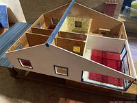 Overhead view showing six-room layout, interior carpets, wallpaper, and accessories