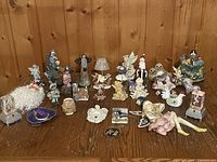 Group shot of all figurines, cubes, switch plates and tealight holder