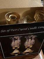 Box containing two crystal candle lamps