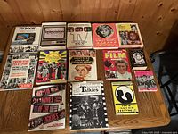 All books laid out on table to show titles and quantity