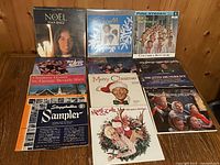 All ten Christmas LPs laid out