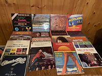 Group of approx. 19 LPs laid out plus 4 standing showing various world, instrumental and soundtrack titles