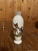 Full view of Bambi porcelain vase standing upright
