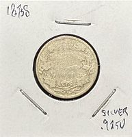 Reverse side showing wreath, crown and denomination