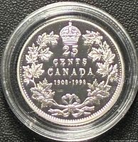 Reverse side of silver proof 25-cent coin showing crown, maple wreath, dates 1908-1998