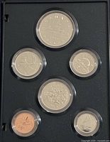 Front view of six-coin 1986 specimen set in black holder