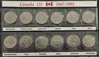 Full holder showing 12 coins in two rows labeled Canada 125 1867-1992