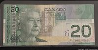 Obverse showing Queen Elizabeth II portrait and denomination 20