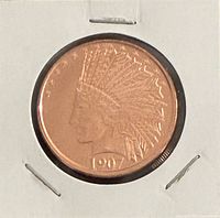Obverse showing Indian Head design dated 1907 in holder