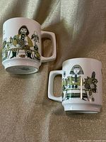 Front view of both Figgjo Market mugs showing pattern and handles