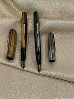 Both Waterman pens with caps removed showing nibs