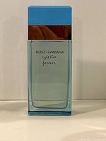 Front view of full perfume bottle