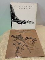 Front covers of both LP albums displayed upright