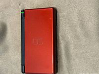 Closed red Nintendo DS Lite top view